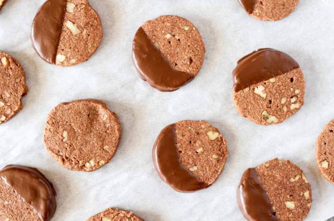 Chocolate Pecan Shortbread Cookies (gluten free) on white parchment paper | www.savorylotus.com