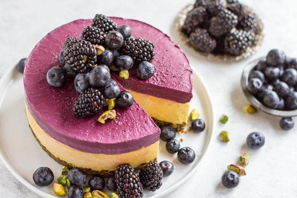 Mango Blackberry Cheesecake on white plate