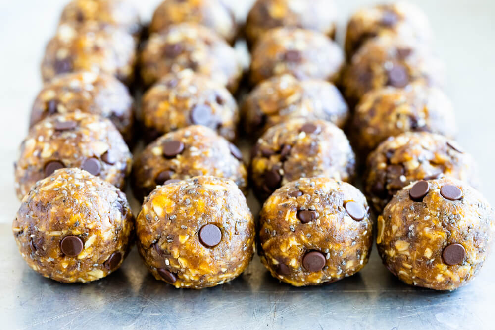 energy balls lined up on a silver tray