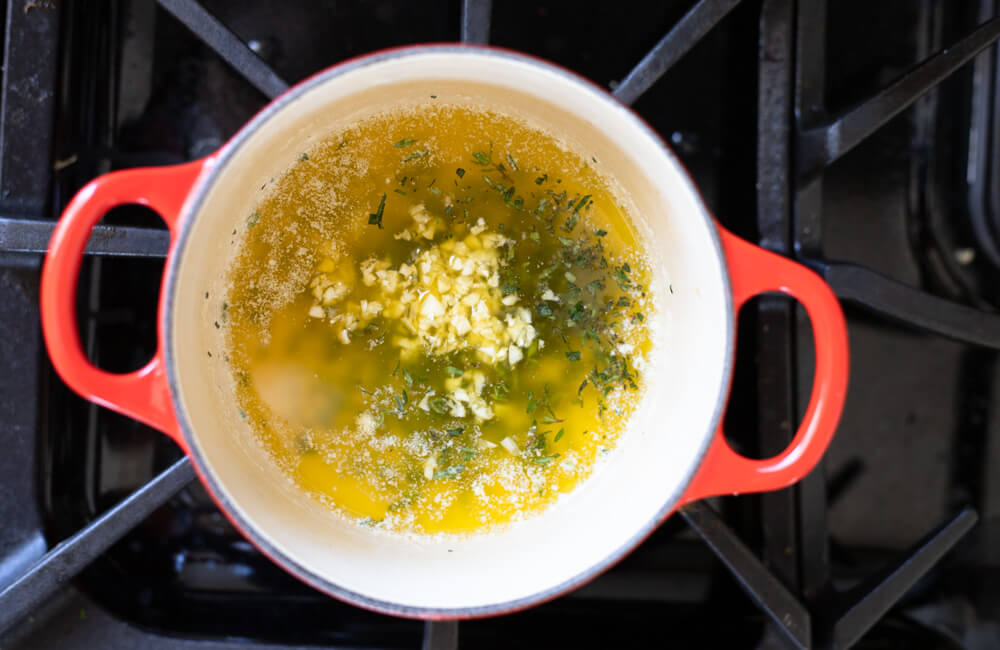 melted butter in red pot