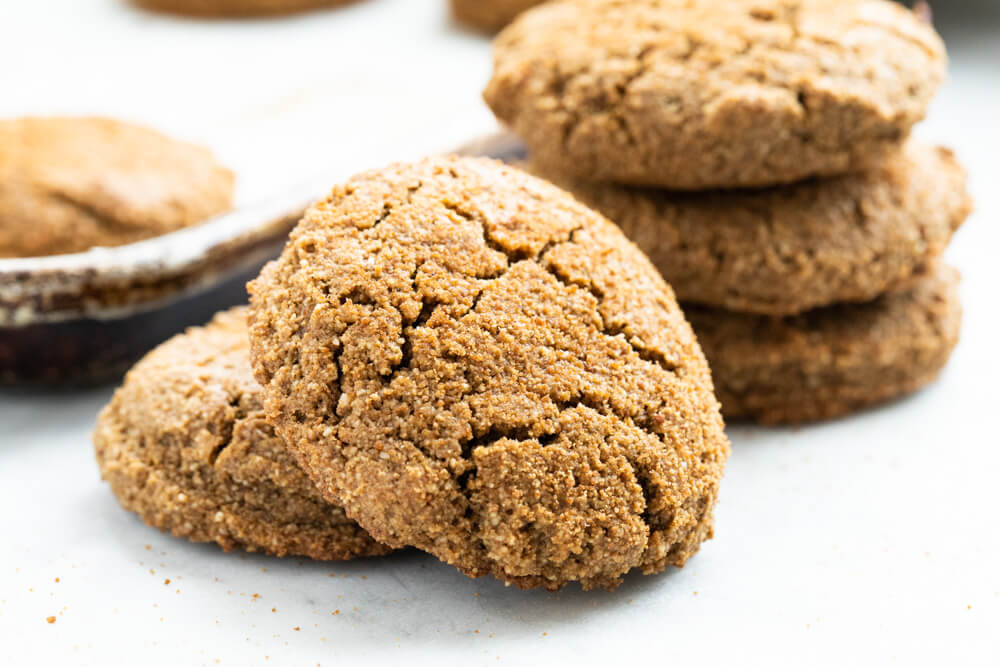 big gingerbread cookies piled on table
