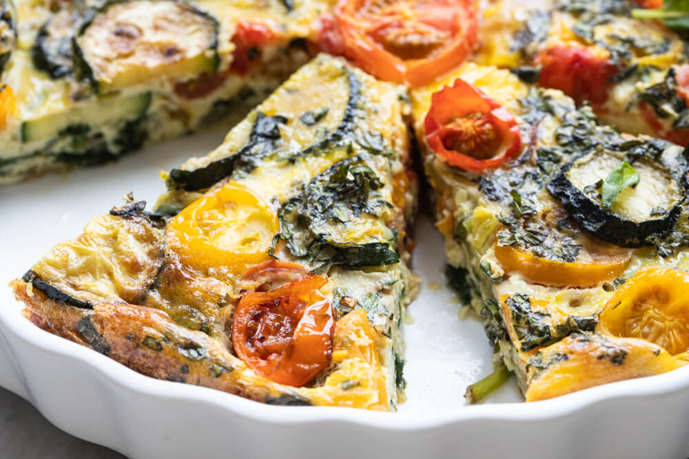 quiche slice in white dish