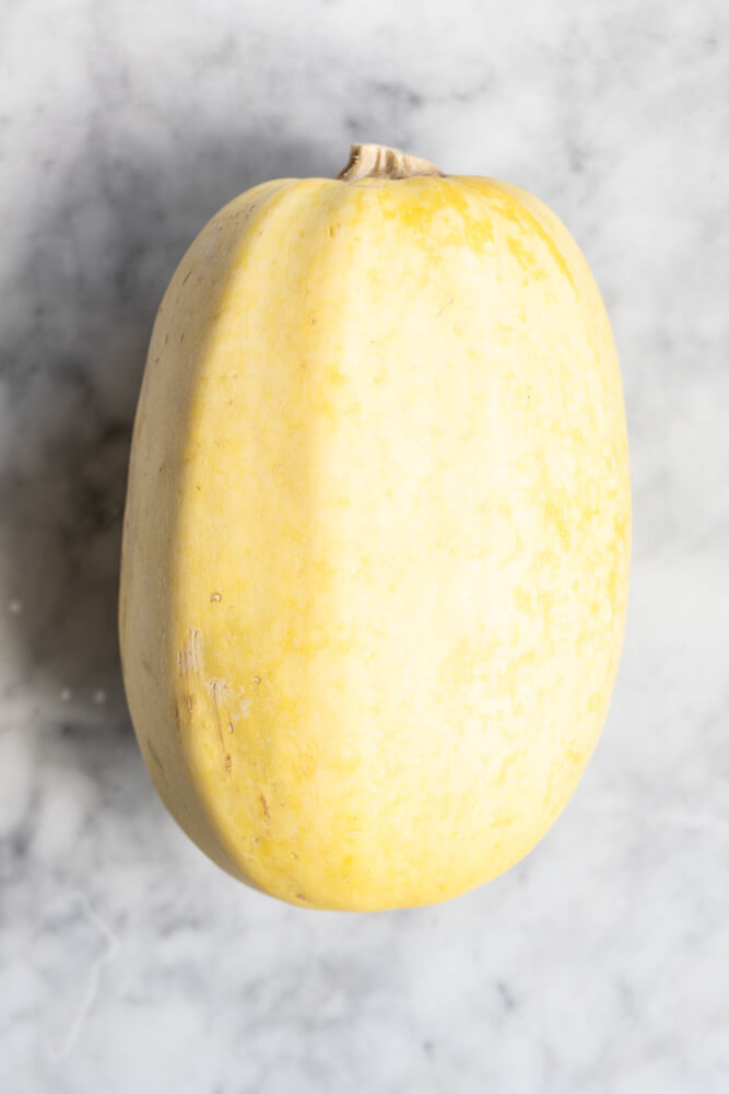 close up of a whole spaghetti Squash