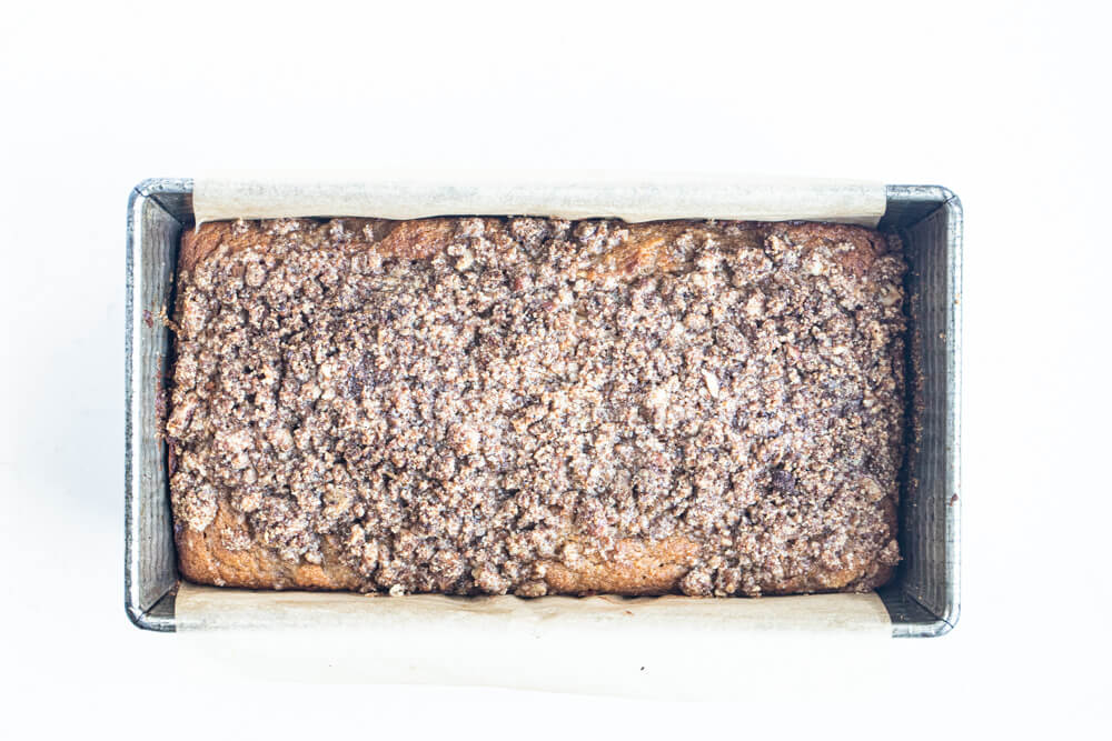 apple bread in a metal loaf pan
