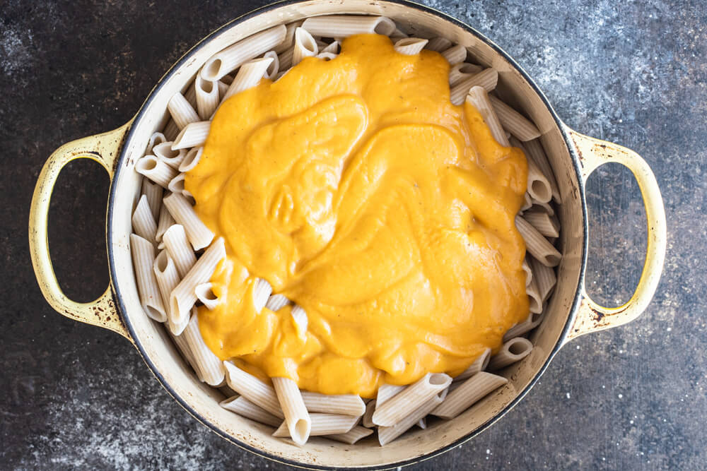 pasta a butternut squash sauce in pot
