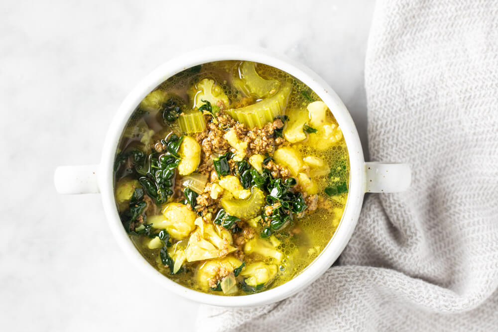 soup in white bowl on white counter