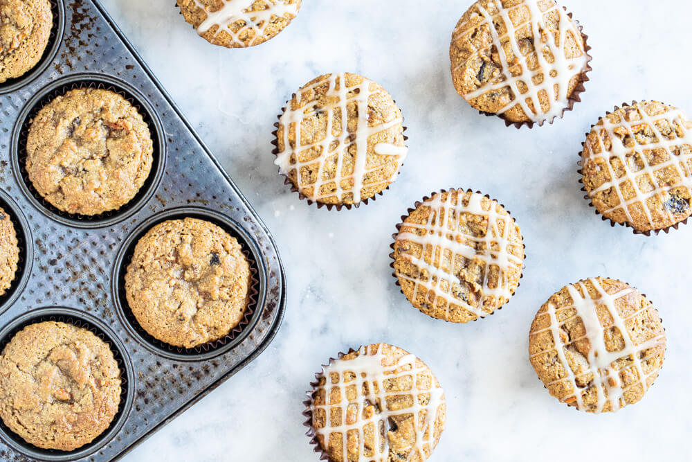 carrot cake muffins with a white glaze