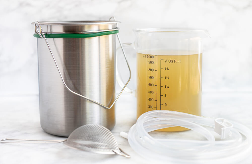 two coffee enema buckets on counter
