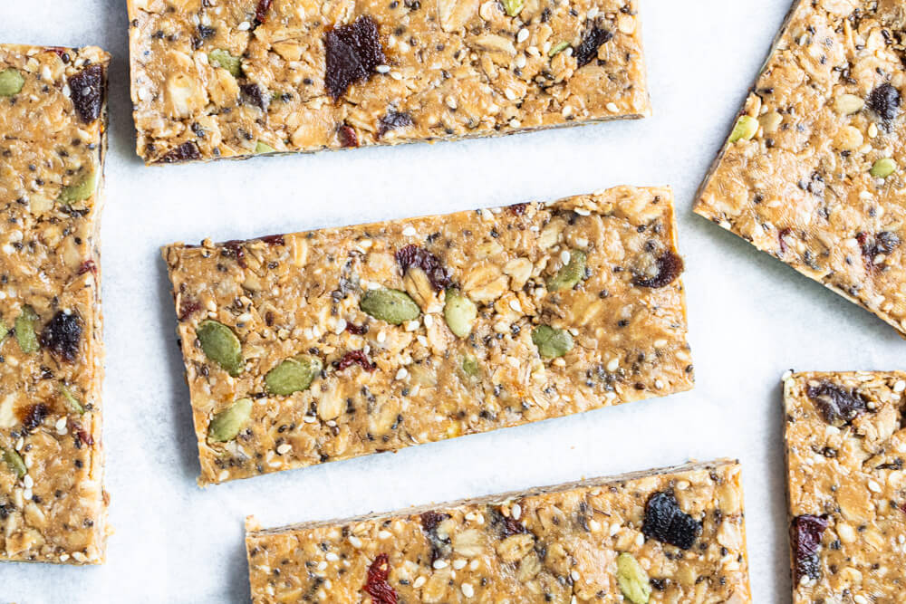 six granola bars on white counter