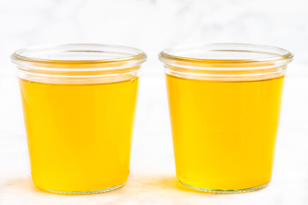 two glass jars of ghee