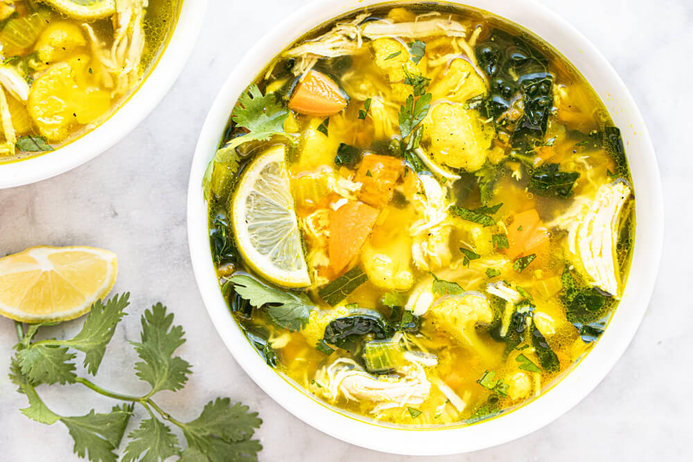 chicken soup in white bowl