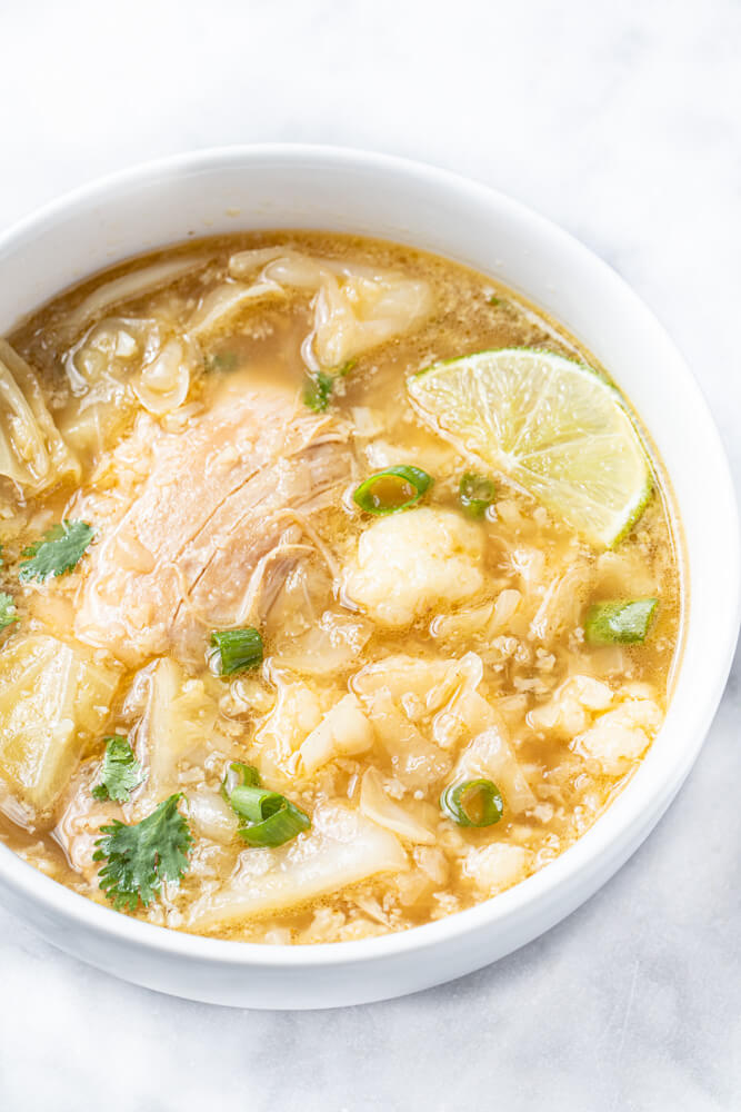 close up of soup in white bowl