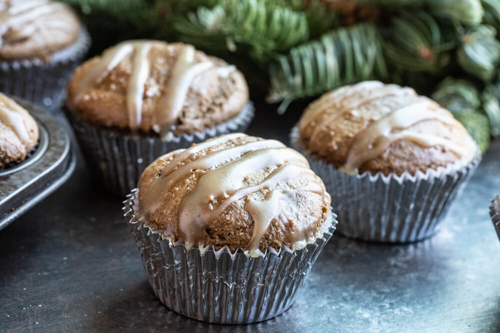 three gingerbread muffins on metal sheet