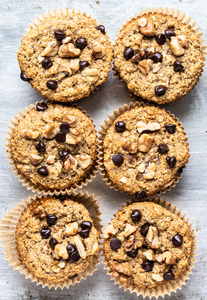 six muffins on a metal sheet pan