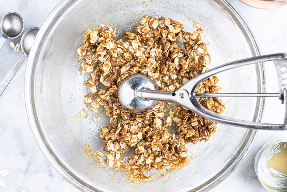 glass bowl with cookie scoop in it