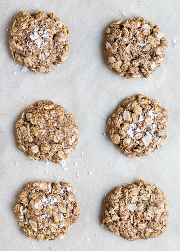 six cookies on parchment paper