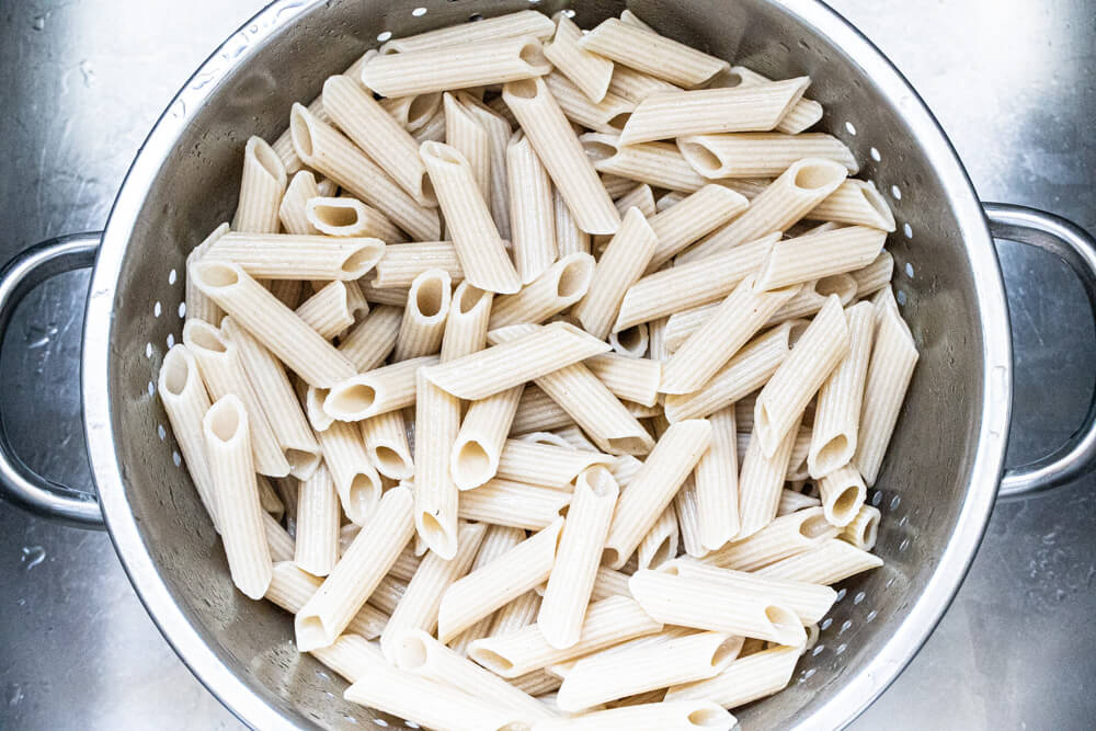 pasta in metal colander