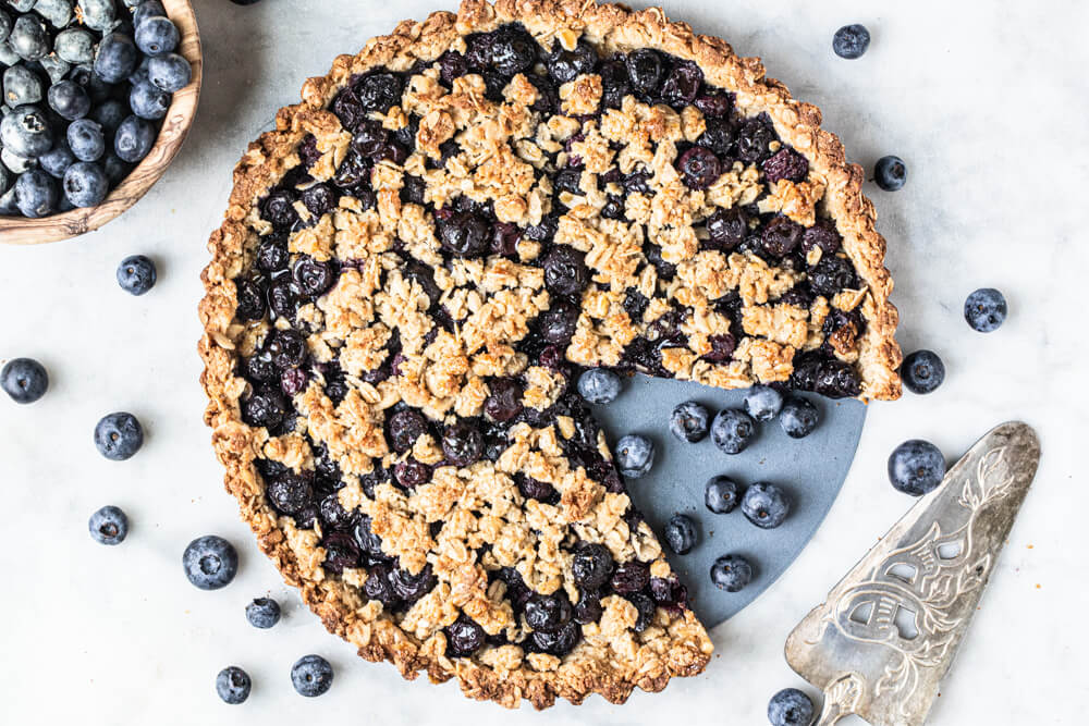 blueberry tart on white counter