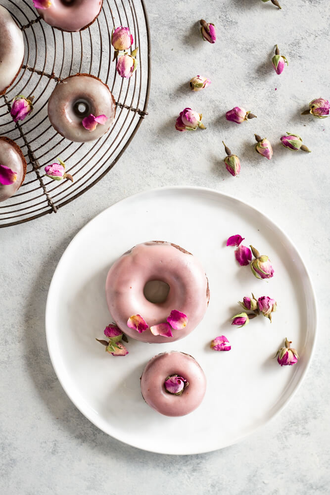 Chocolate Rose Donuts on white plate with dried roses