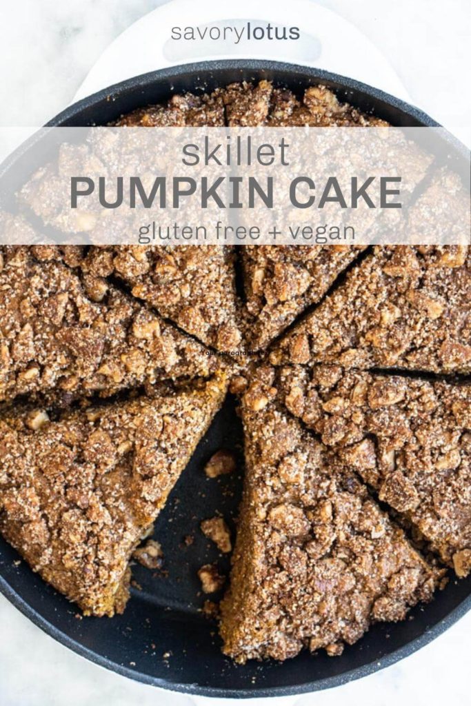 close up of pumpkin cake in a skillet sliced up