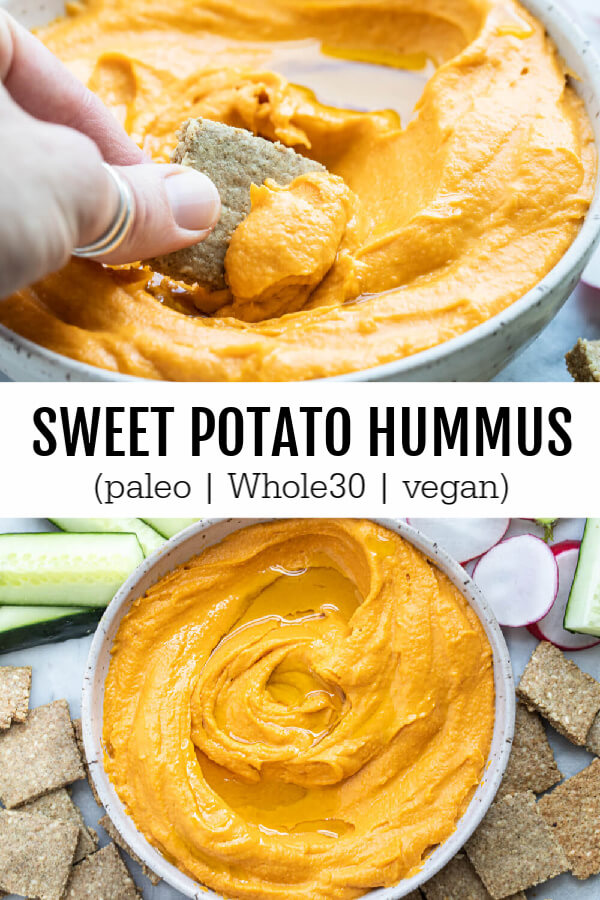 close up of hand dipping cracker into sweet potato hummus
